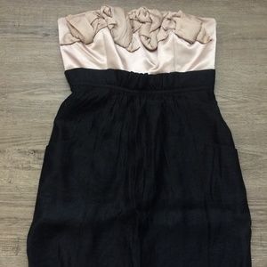 Strapless tan and black dress with pockets